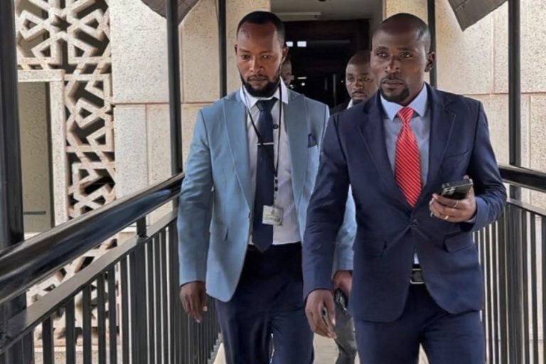 Ashaba Vincent with Abraham Luzzi at Parliament